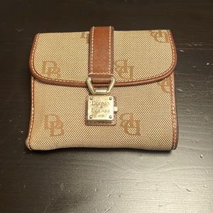 Up for sale is a used dooney and bourke wallet.